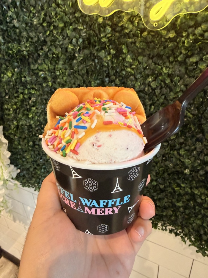 Bubble waffle sundae cup with sprinkles at a catered event